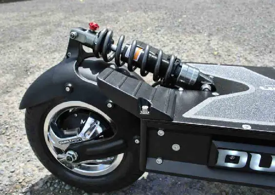 rear wheel with motor and suspension on an electric scooter