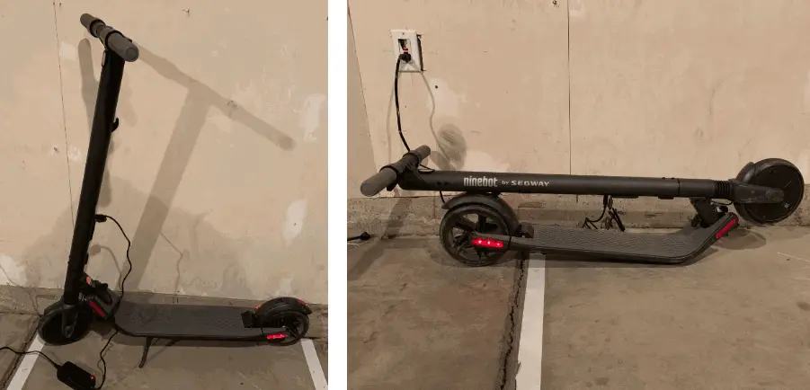 black Segway Ninebot ES2 electric scooter both unfolded and folded while chargning in an empty room