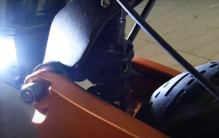 A closeup of the suspension of the Blade 10 GT+ e-scooter