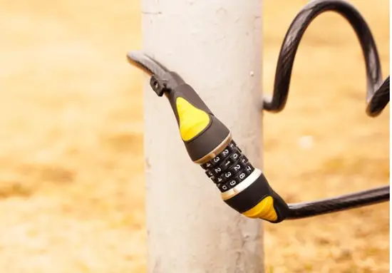 Lock fixed to a post