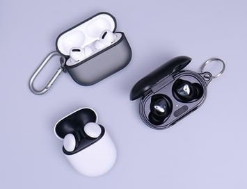 three different bluetooth earbud sets for while riding an electric scooter