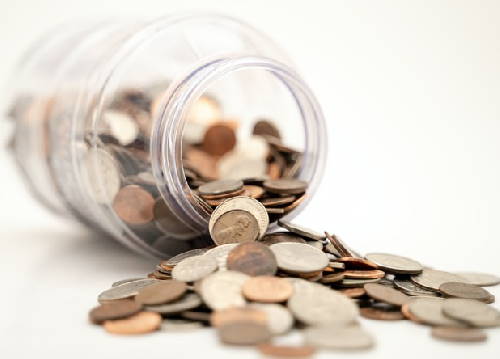 financing represented by a jar full of coins