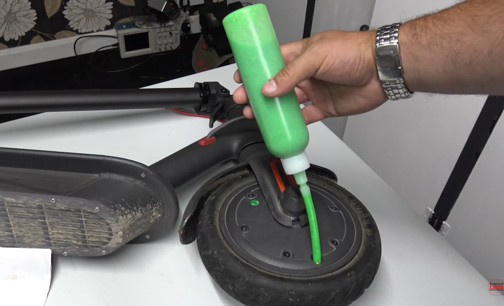 fixing flat tire with slime step 2