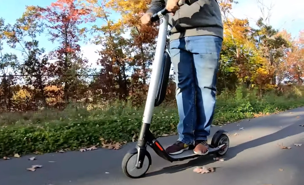 guy riding Ninebot ES4