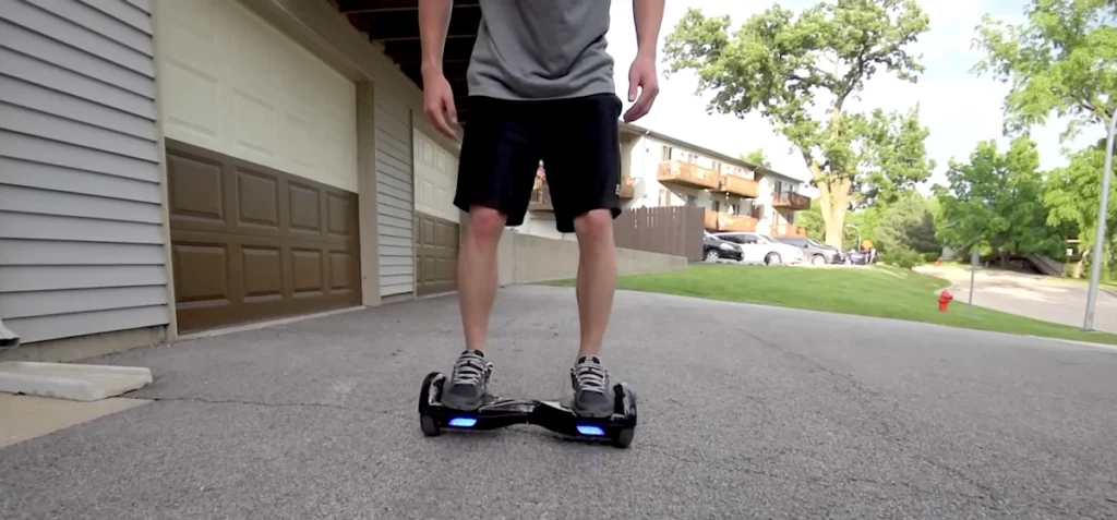 guy riding a hoverboard.