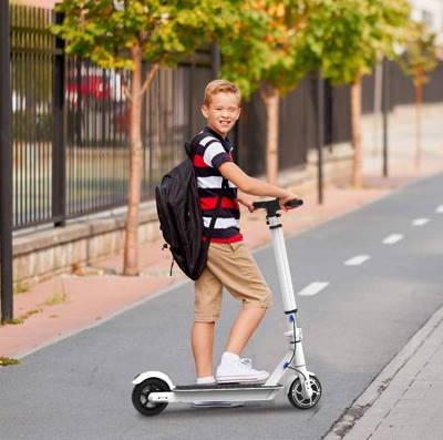 a boy on a Hiboy S2 Lite electric scooter