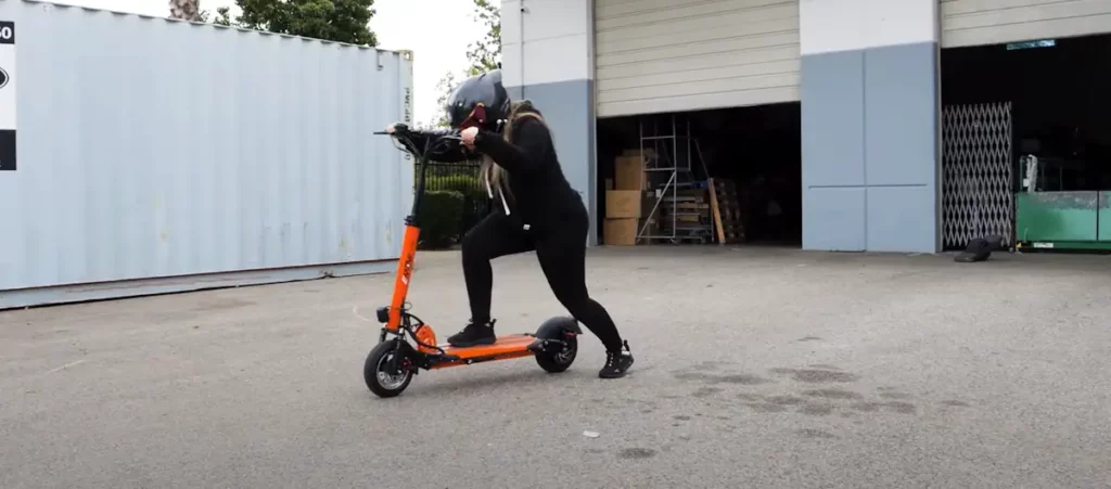 kick-starting an electric scooter