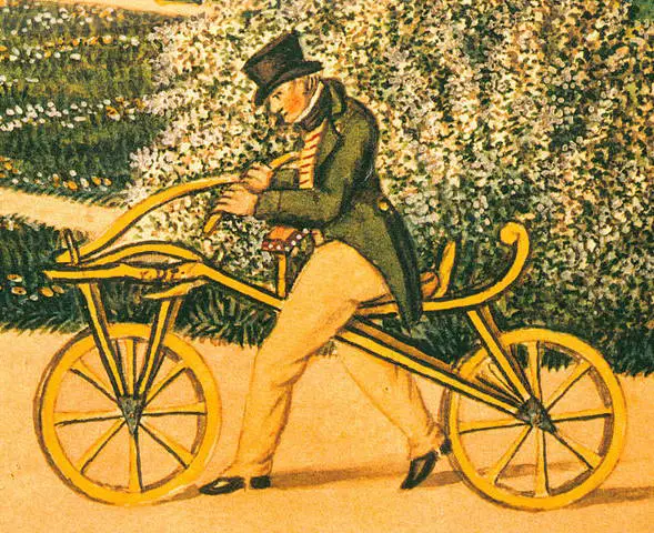 an illustration of the first velocipede model called the Laufmaschine and a person riding it