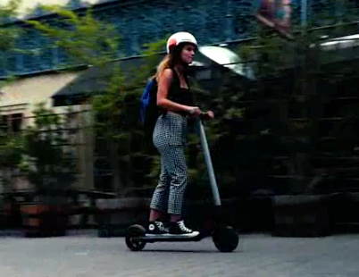 person riding the Ninebot ES2