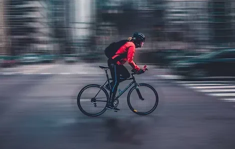 person going fast on an electric bike