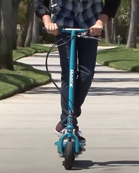 front view of a person riding a Razor E200