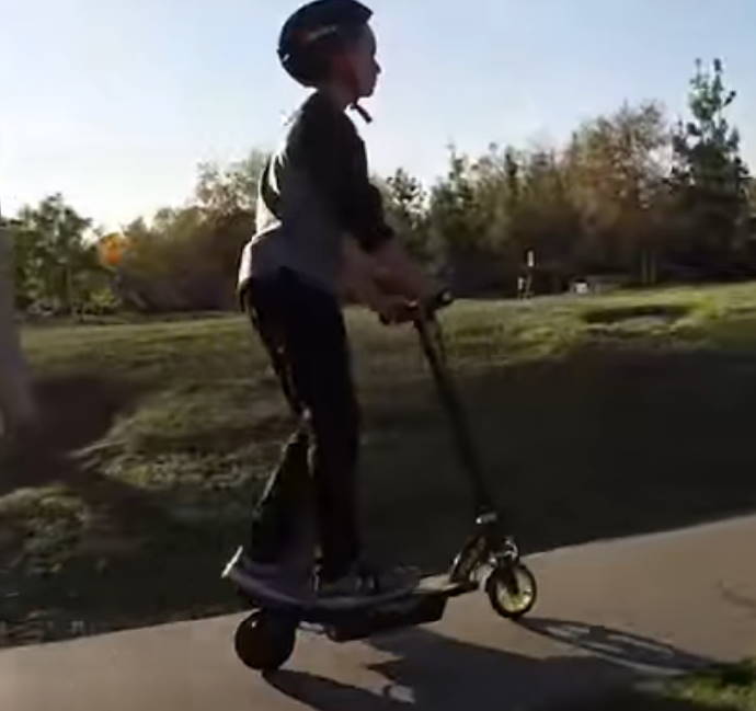 child climbing a hill with the Razor Power Core E90