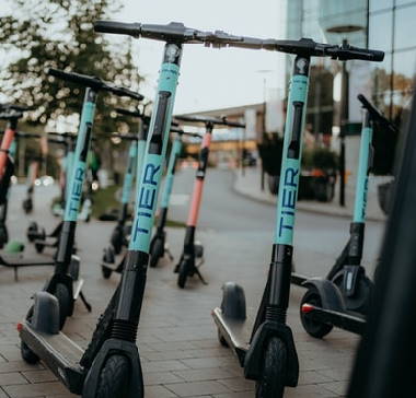 several Tier rental electric scooters