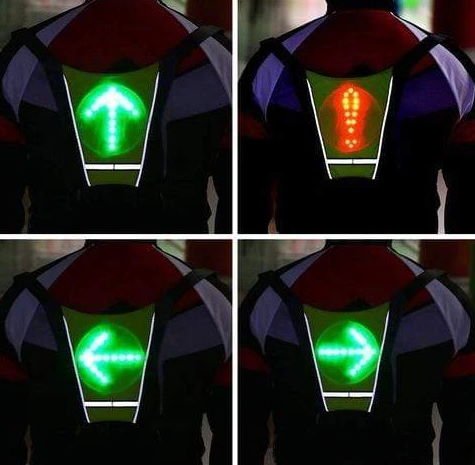 turn signal widget vest worn on the back of a person showing different signals