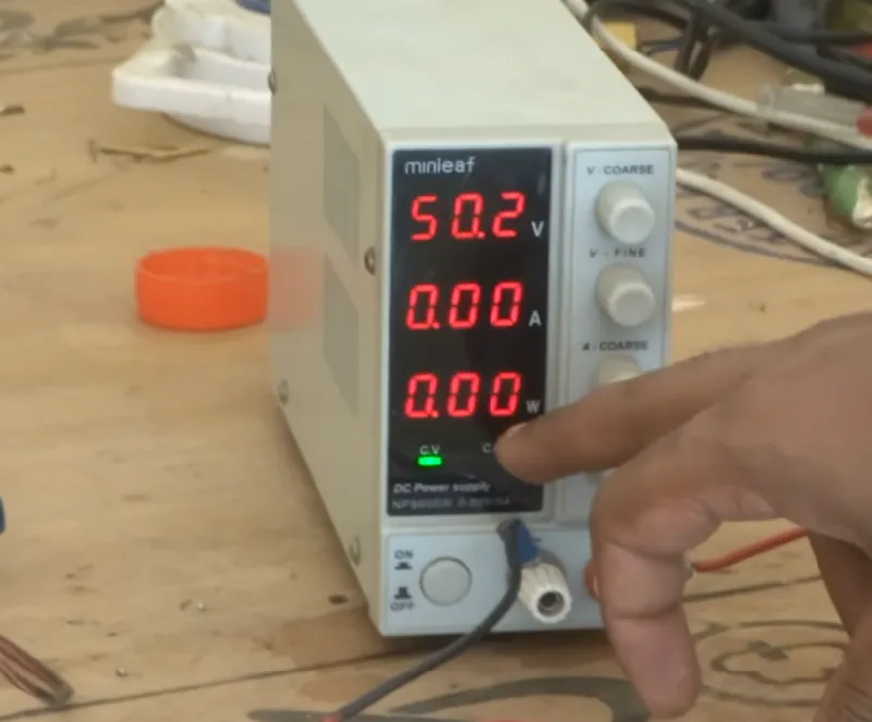 voltmeter showing the voltage of a rewinded electric scooter motor